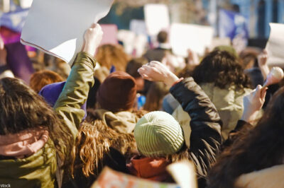 A backward view of protesters.