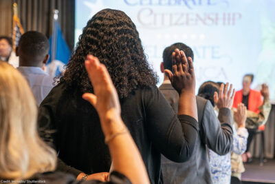 New naturalized US citizens take Oath of Allegiance at special naturalization ceremony.