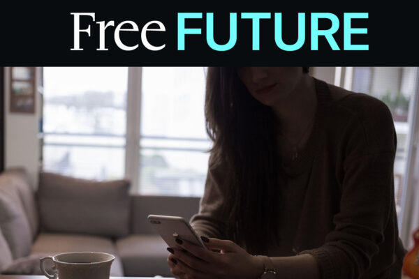 A woman looking at her mobile phone